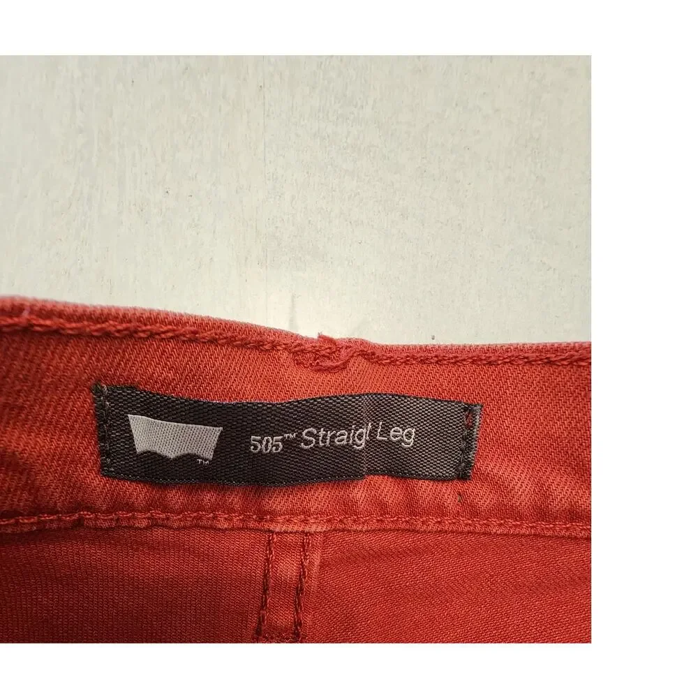 Levis Women's Cut off Denim Shorts SZ 4 Distressed Butterfly Patch Rust
